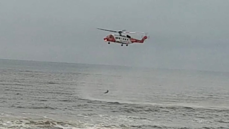 The Coast Guard helicopter was dispatched to the scene