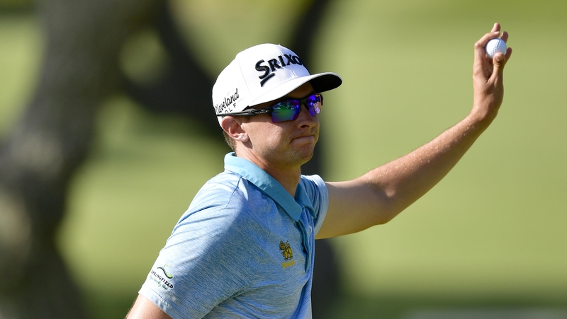 John Catlin of The United States reacts after putting on the 18th green