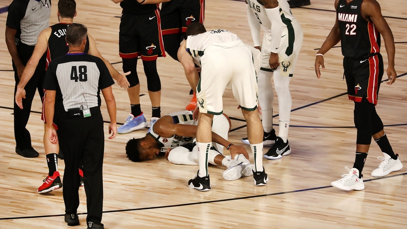 Bucks' star player Giannis Antetokounmpo went off injured in the first half