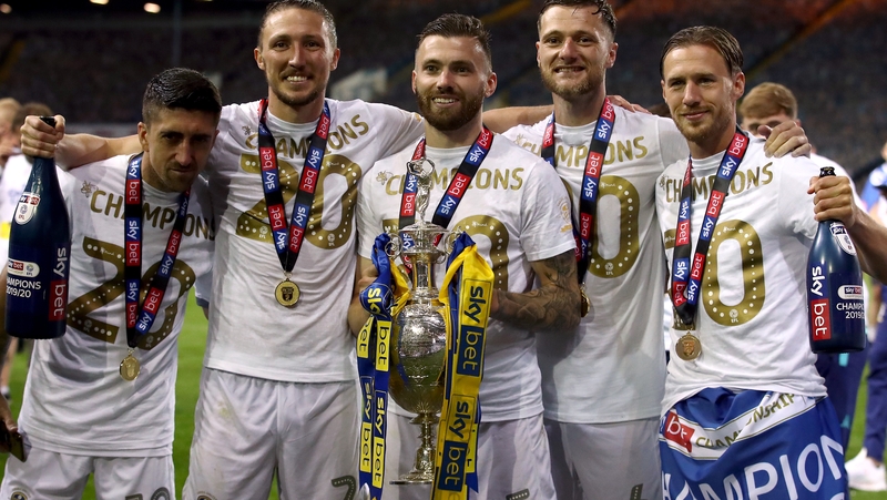 Leeds United's Pablo Hernandez, Luke Ayling, Stuart Dallas, Liam Cooper and Barry Douglas celebrate with the Championship trophy in July