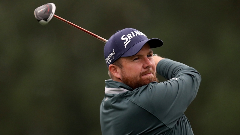 Shane Lowry hits his tee shot on the 14th
