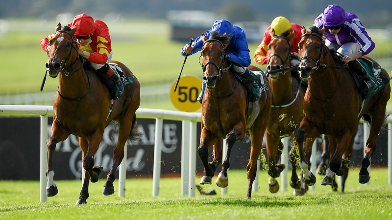 Thunder Moon, left, with Declan McDonogh up, races clear of the field