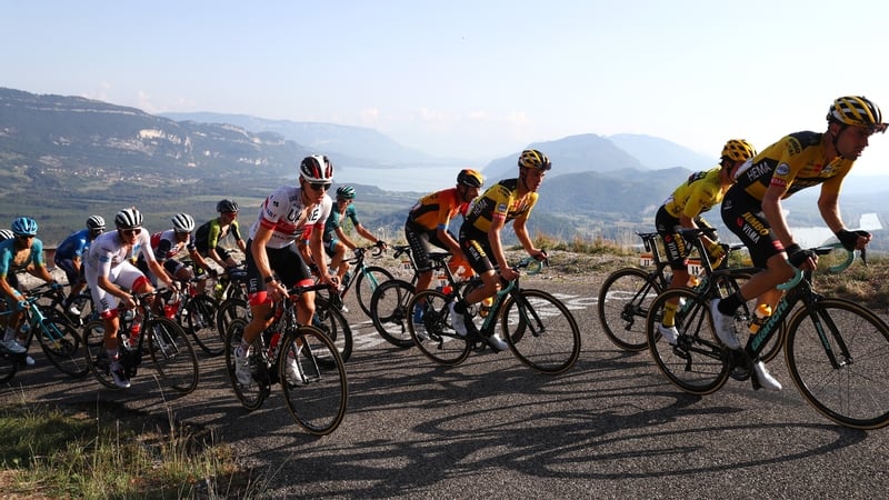 Tadej Pogacar leads the peloton up the gruelling Col du Grand Colombier