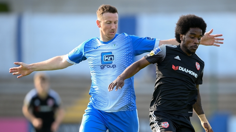 Walter Figueira of Derry City in action against Shane McEleney of Finn Harps