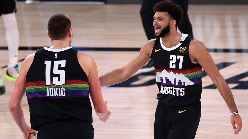Jamal Murray and Nikola Jokic of the Denver Nuggets celebrate