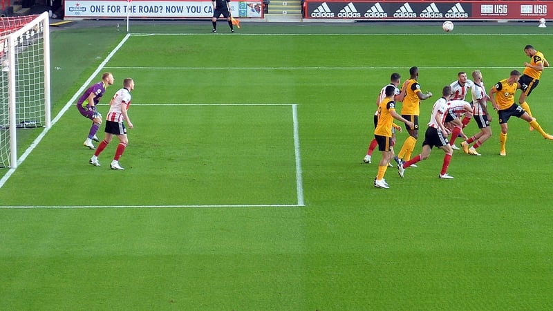 Romain Saiss scores Wolves second goal with a powerful header