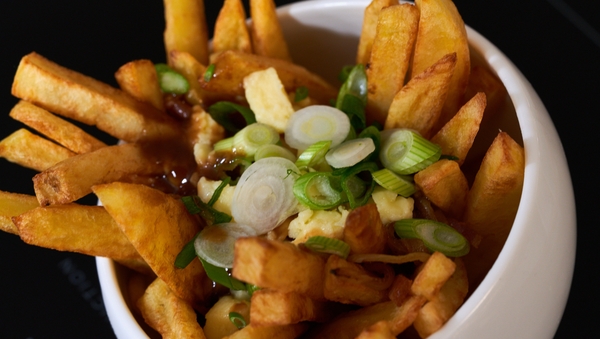 Irish Cheddar Cheese Curd Poutine with Smoked Bacon & Whiskey Gravy.