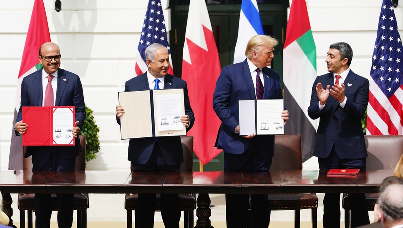 The historic agreements were sealed with a signing ceremony on a flag-decorated White House lawn