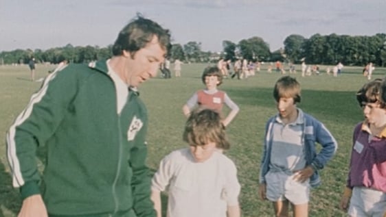 FAI National Director of Coaching John Jarman with boys during soccer training (1975)