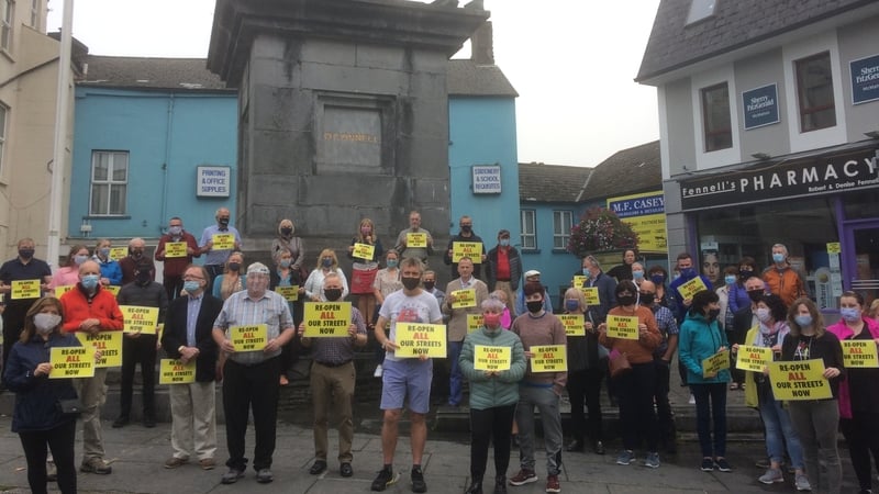 Up to 100 people took part in a protest through the town last week calling for an end to pedestrianisation