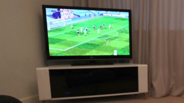 Manager leads team to victory from 8,000km away
