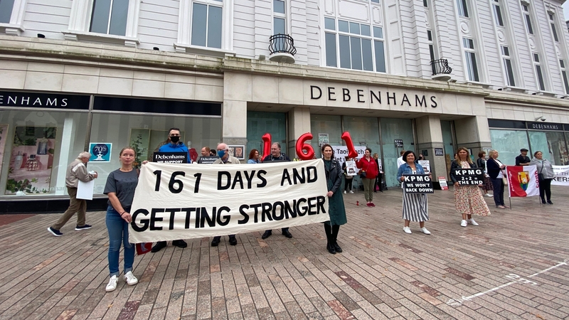 Former Debenhams workers outside the Patrick St store in Cork city