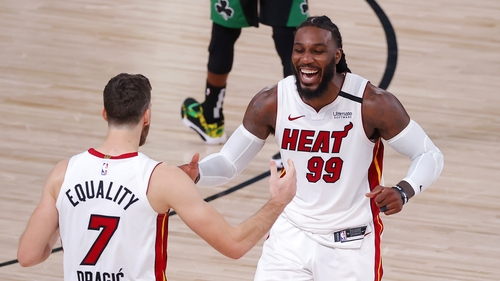 Jae Crowder and Goran Dragic of the Miami Heat react after their Game Two win over Boston Celtics