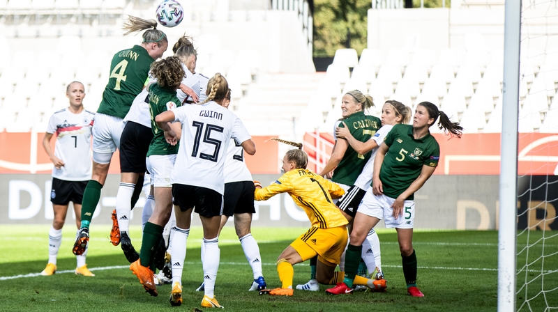 Louise Quinn rises for a header in Essen