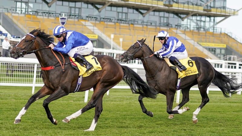 Jim Crowley and Alkumait (L) on their way to winning the Dubai Duty Free Mill Reef Stakes from Silvestre De Sousa and Fivethousandtoone