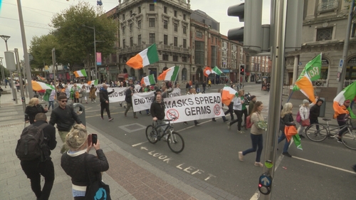Around 40 people gathered in front of the GPO holding banners