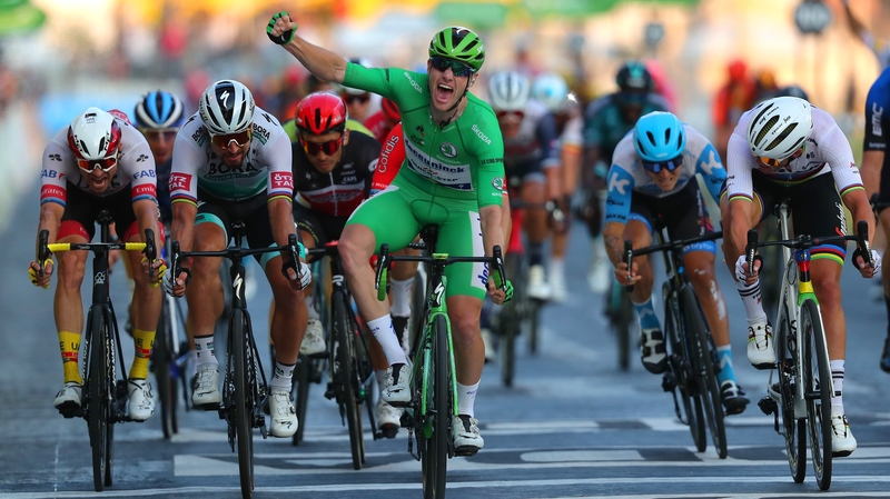 Sam Bennett sprints to victory on the Champs-Elysées