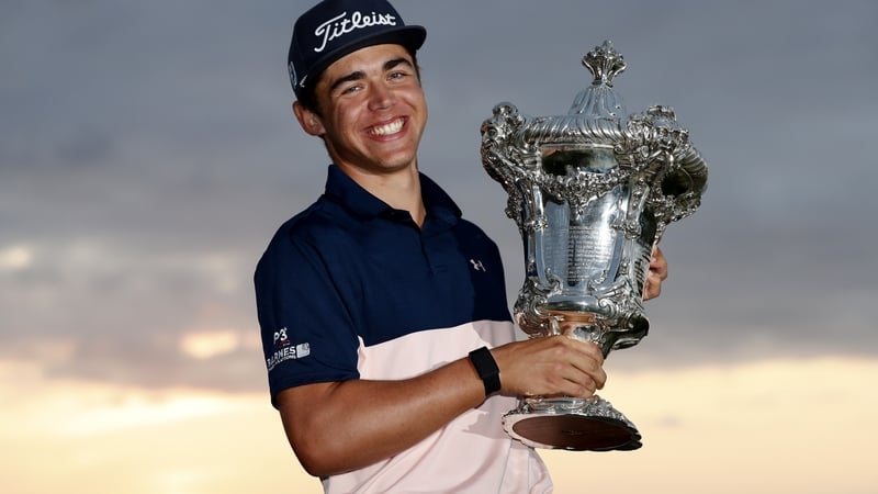 Garrick Higgo of South Africa poses with the trophy