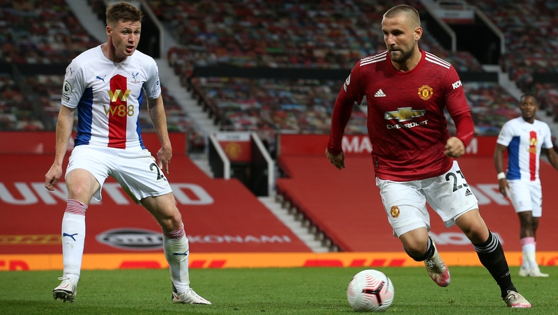 Luke Shaw is marshalled by James McCarthy as Palace beat United 3-1 on Saturday