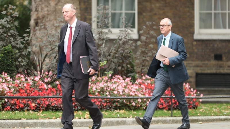 Chris Whitty (left) and Patrick Vallance arrive in Downing Street