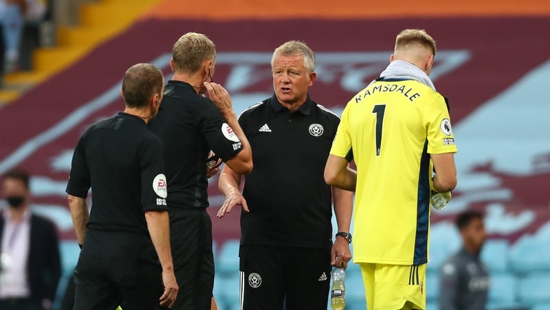 Chris Wilder was late for his post-match press conference after trying to quiz referee Graham Scott on the decision to send off John Egan