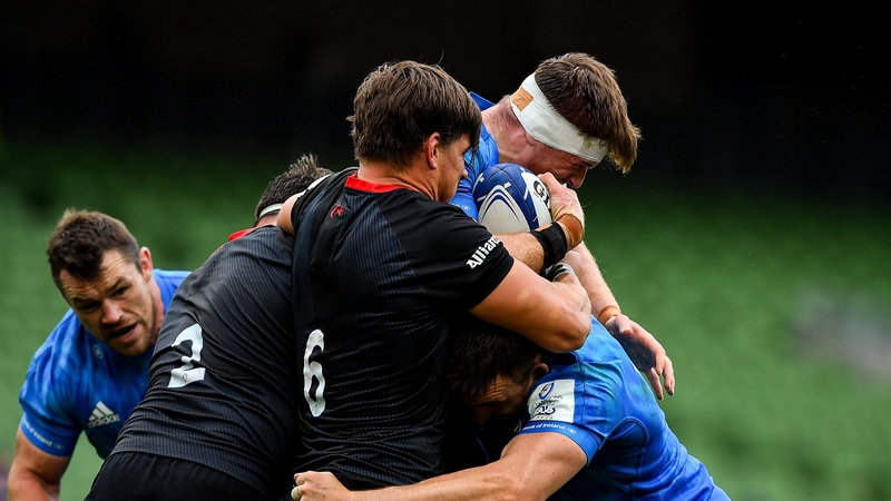 Michael Rhodes tackles Leinster's Ryan Baird