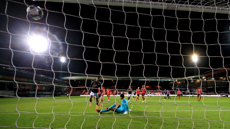 Substitute Marcus Rashford scores United's second goal at Kenilworth Road