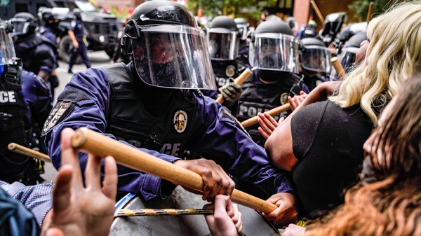 Riot police intervene in Louisville after the grand jury decision is announced