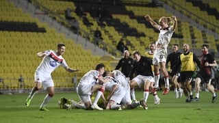 Dundalk players celebrate after the penalty shoot out