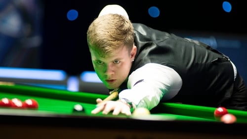 Aaron Hill is into the last 32 in Belfast
