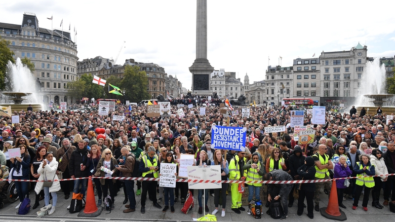 Protesters in Trafalgar Square, London today at a mass rally against Covid-19 restrictions