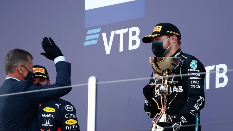 Valtteri Bottas celebrates with the trophy