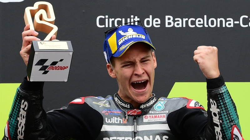 Fabio Quartararo celebrates on the podium