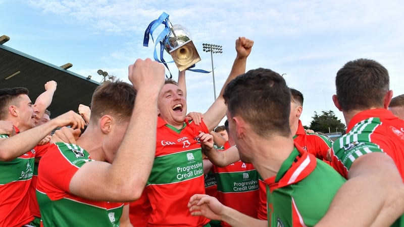 Ballymun Kickhams players celebrate after their commanding win