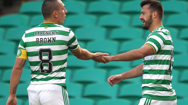 Albian Ajeti (R) and Scott Brown