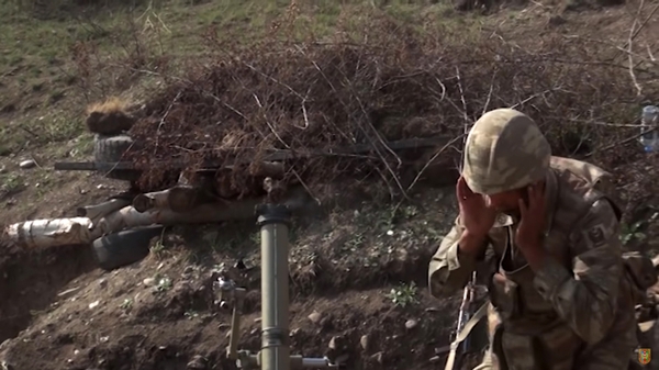 Azerbaijani army serviceman during a military operation at the contact line of the self-proclaimed Nagorno-Karab