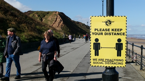 Walkers on the promenade at Saltburn-by-the-Sea in Yorkshire