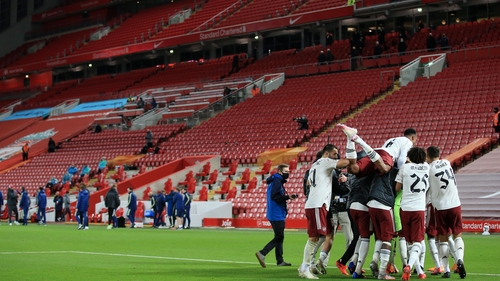 Arsenal go through