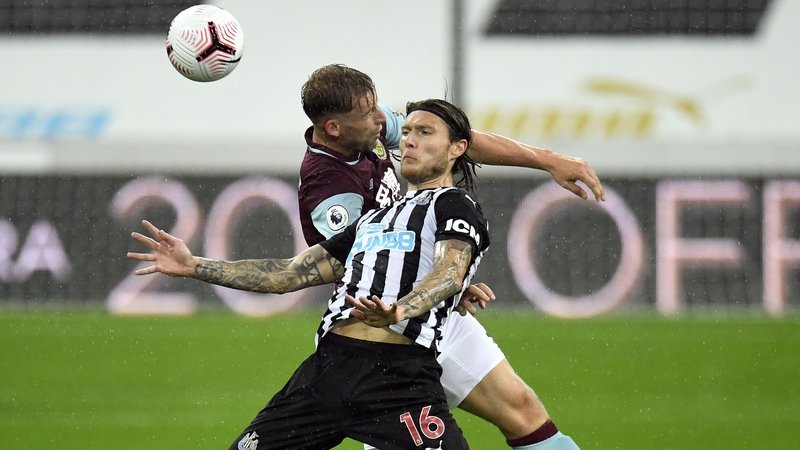Newcastle and Ireland's Jeff Hendrick battles for the ball with Charlie Taylor