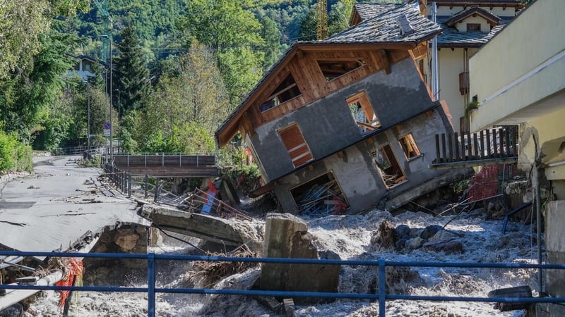 A house tilts after heavy rains in Cuneo, Italy when the Vermenagna river flooded the village