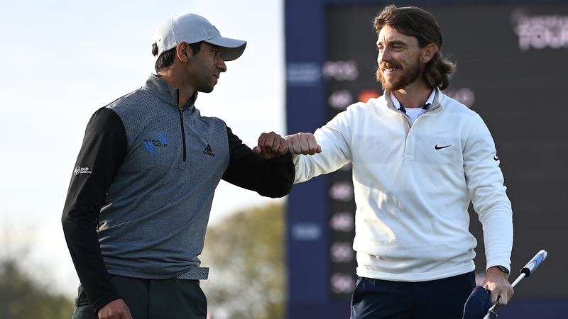 Tommy Fleetwood congratulates Aaron Rai
