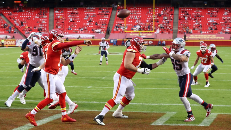 Patrick Mahomes throws a pass at Arrowhead Stadium
