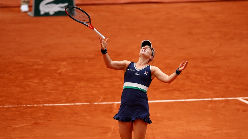 An elated Nadia Podoroska celebrates a victory she will never forget at Roland Garros