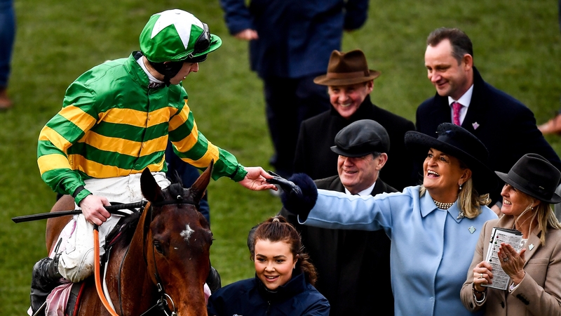 Jockey Mark Walsh and JP McManus after Aramax won the Boodles Juvenile Handicap at the 2020 Cheltenham Festival