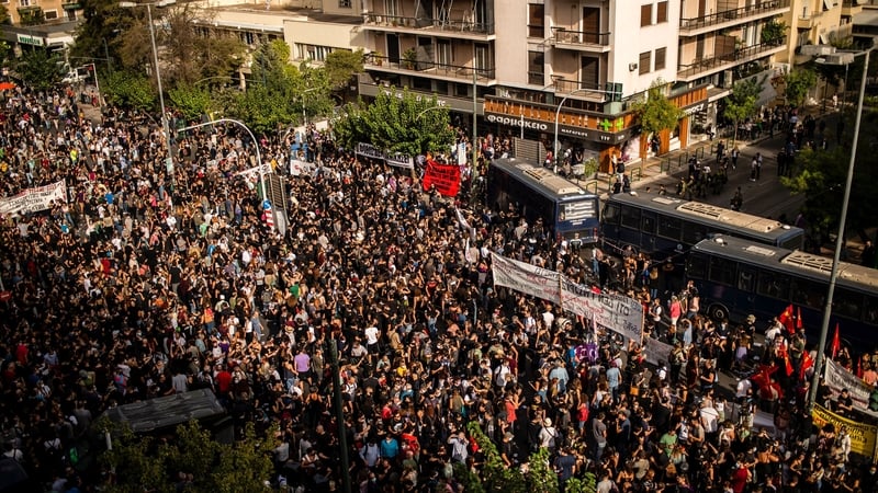 Crowds gathered outside the court in Athens