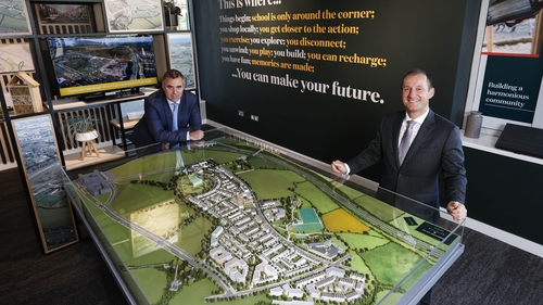 Quintan's Michael Hynes and Eddie Byrne show the Cherrywood Village Model