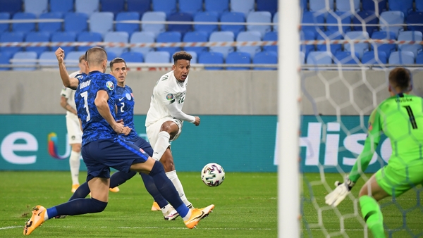 Callum Robinson with an effort on the Slovakian goal