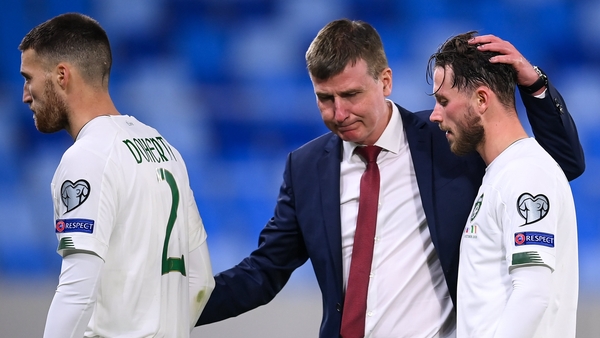 Stephen Kenny consoles Matt Doherty and Alan Browne after they missed penalties int he shootout