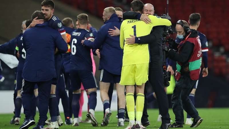 David Marshall and Steve Clarke embrace after Scotland's shootout heroics