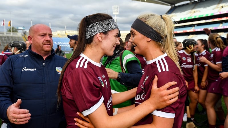 Helebert, right, celebrates the All-Ireland victory over Kilkenny with Anne-Marie Starr